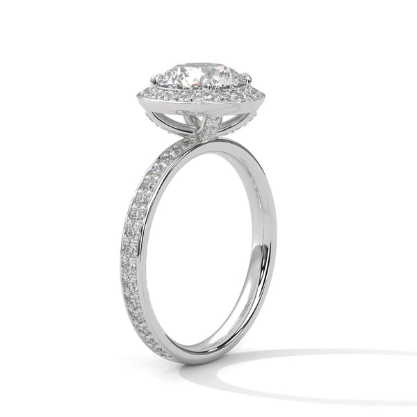“Radiant Halo Ring—brilliant center diamond, dazzling halo sparkle, and white-gold elegance crafted to symbolize everlasting love, timeless beauty, and unforgettable moments.”
