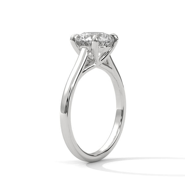 “Aurora Ring—round brilliant diamond sparkle, classic six-prong elegance, and timeless solitaire beauty crafted to symbolize enduring love, refined style, and radiant grace.”