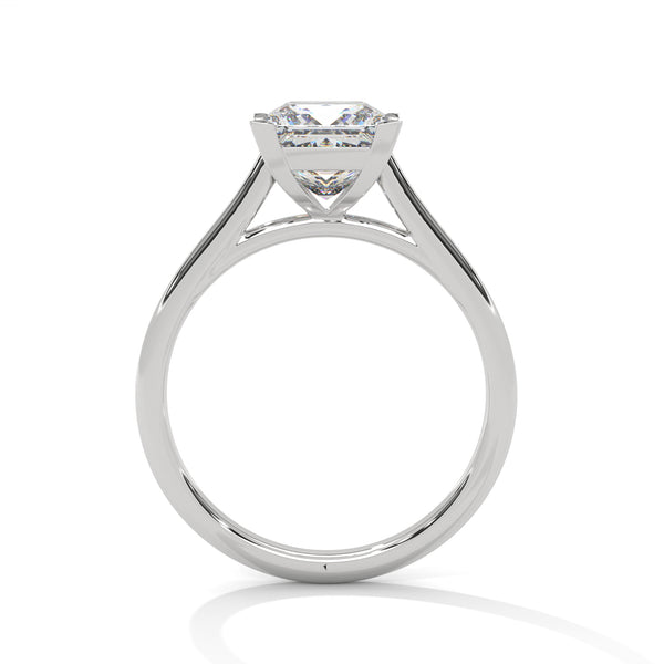 “Luna Ring—princess-cut diamond brilliance, minimalist four-prong elegance, and timeless solitaire beauty crafted to symbolize pure love, modern simplicity, and lasting sophistication.”