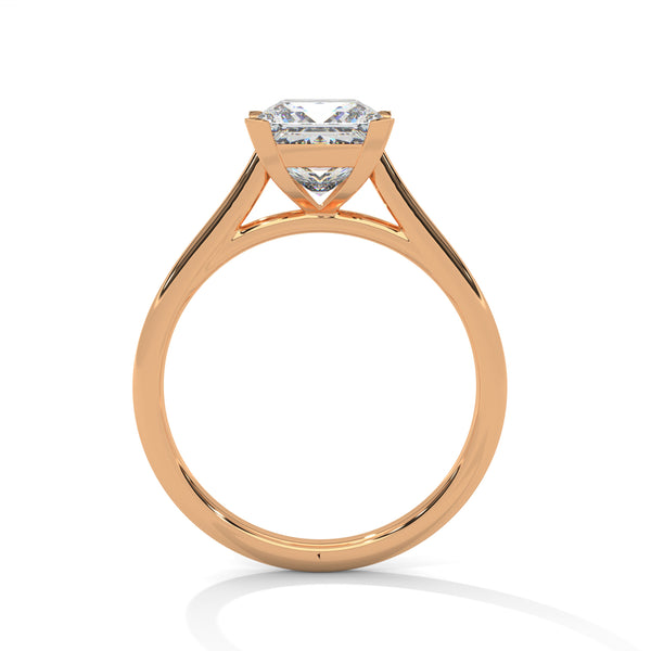 “Luna Ring—princess-cut diamond brilliance, minimalist four-prong elegance, and timeless solitaire beauty crafted to symbolize pure love, modern simplicity, and lasting sophistication.”